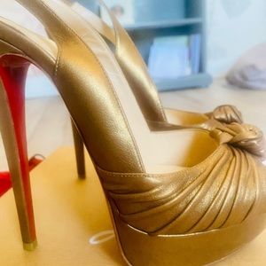Christian Louboutin “ Jenny” Slingbacks in gold. Size 8.5